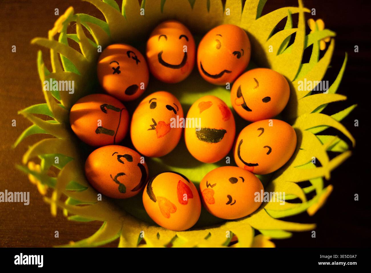 Painted Easter eggs with emoji faces. Stock Photo