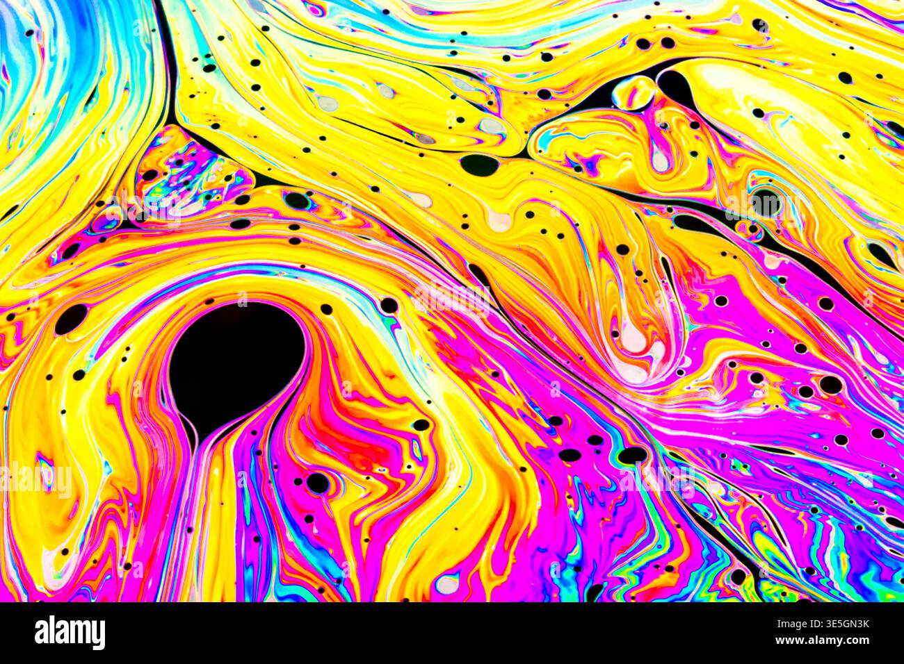 Close up on a soap bubble with random abstract forms and colors for background Stock Photo