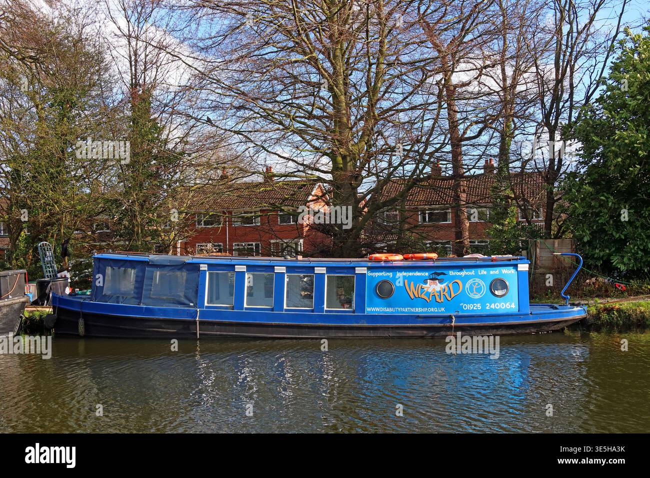 Wizard disability access narrowboat moored on a Greater Manchester canal, England, UK. Stock Photo