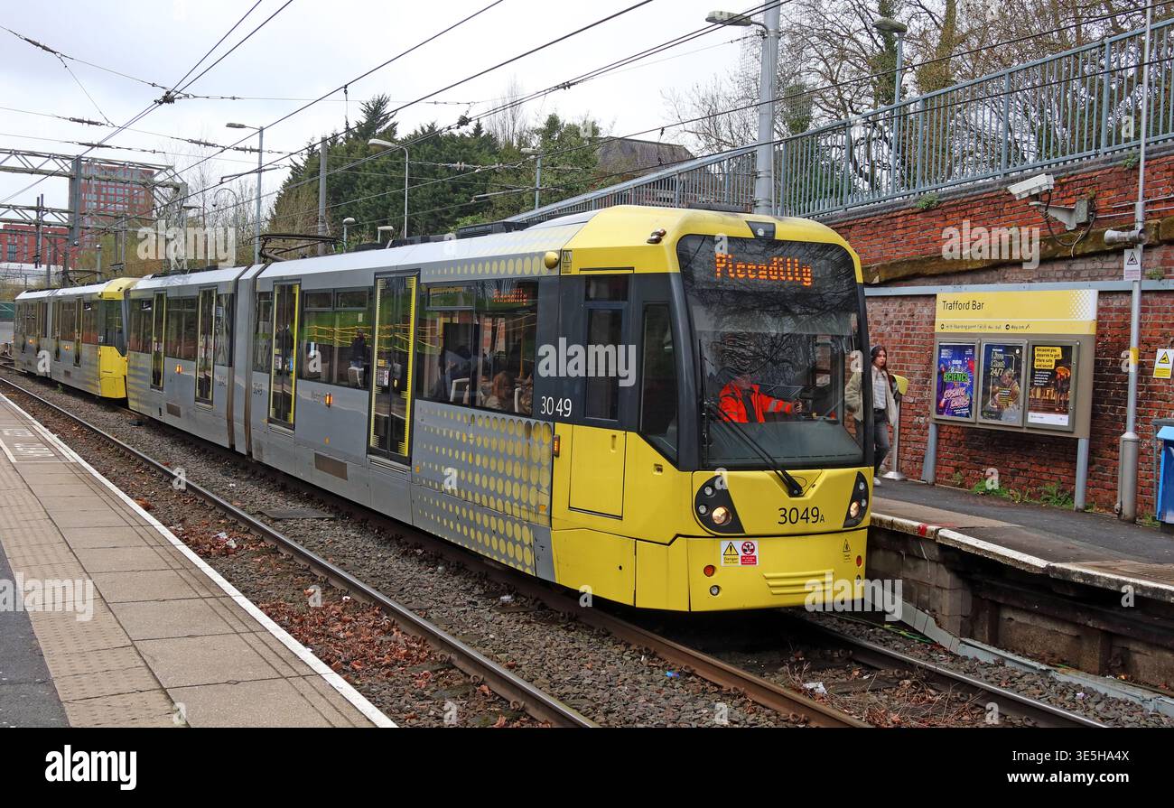 Manchester Metrolink tram at Trafford Bar stop, Old Trafford, Greater Manchester, England, UK. Stock Photo