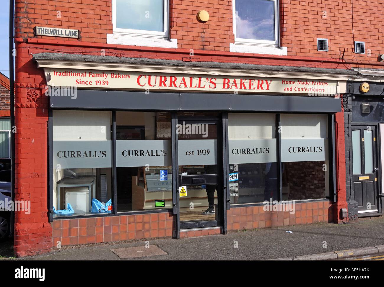 Curralls Bakery traditional shopfront on Thelwall Lane, Warrington, Cheshire, England, UK. Stock Photo