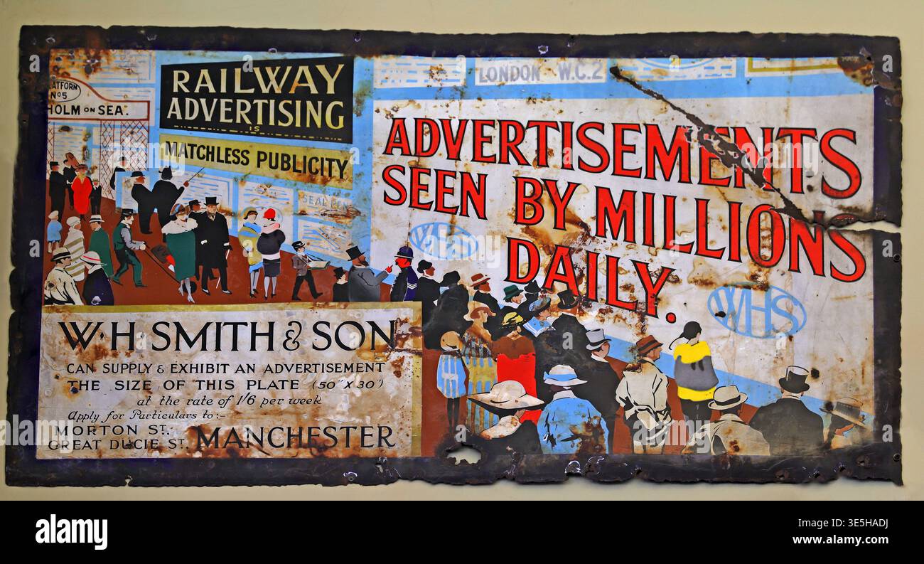 Historic W H Smith & Son railway advertising sign promoting advertisements seen by millions daily. Stock Photo