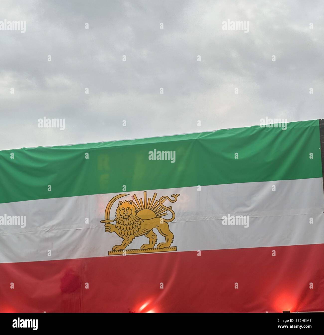 Pre 1979 Iranian Lion ans Sun flag displayed in North Finchley London UK, known as Little Tehran taken Mrch 23rd 2026 - Smartphone Captured Stock Image