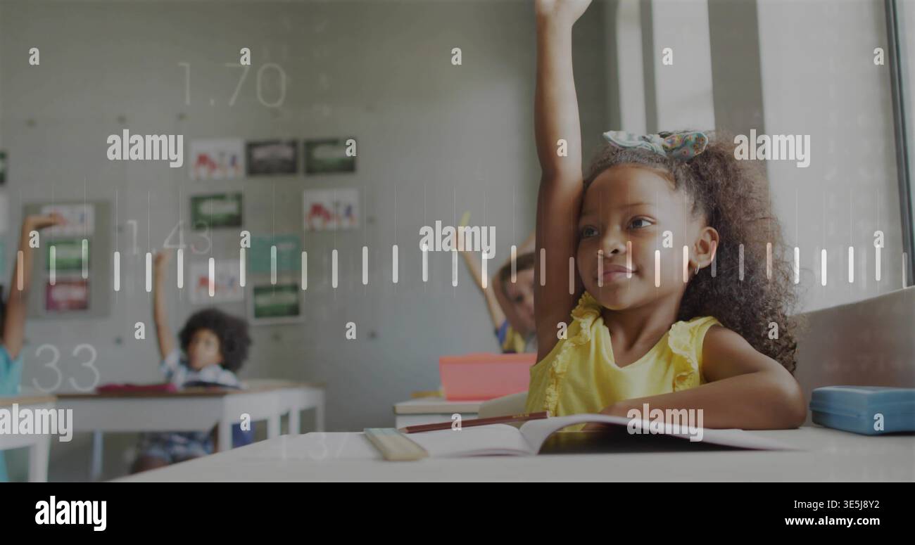 Girl in yellow dress raising hand at front desk in classroom, with ...