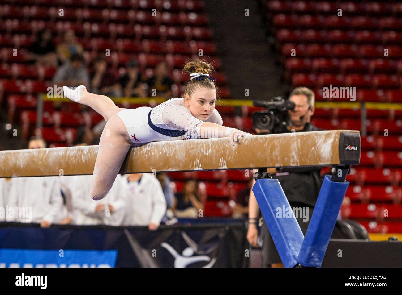 Arizona Sophie Derr competes on beam in an NCAA regional gymnastics ...
