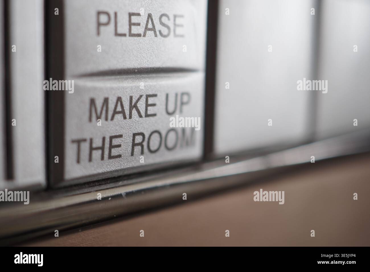 Make up the room request button in hotel Stock Photo