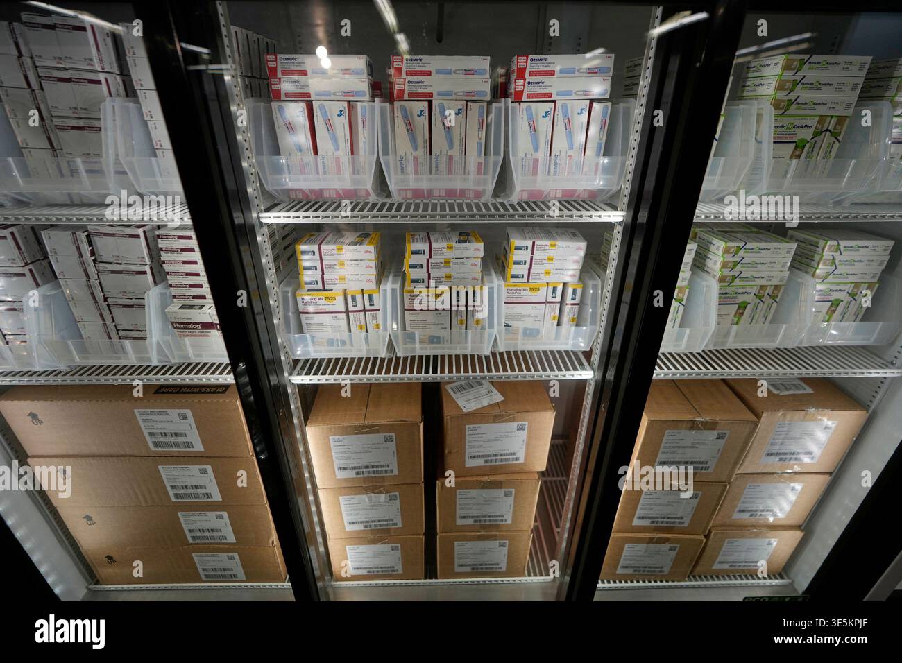 FILE - Packets of insulin vials and pens are warehoused at a Kaiser ...