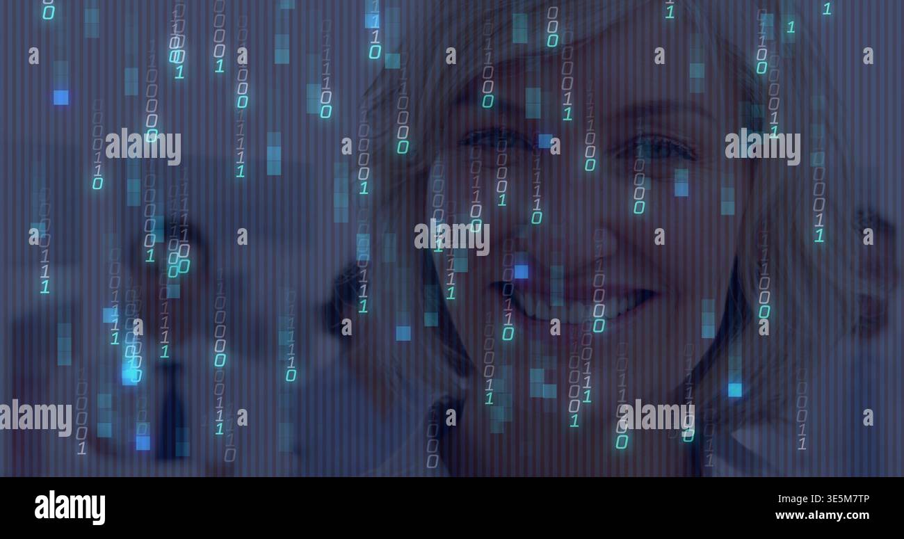 Smiling woman appearing amid binary code at office, with blurred coworkers wearing business attire Stock Photo