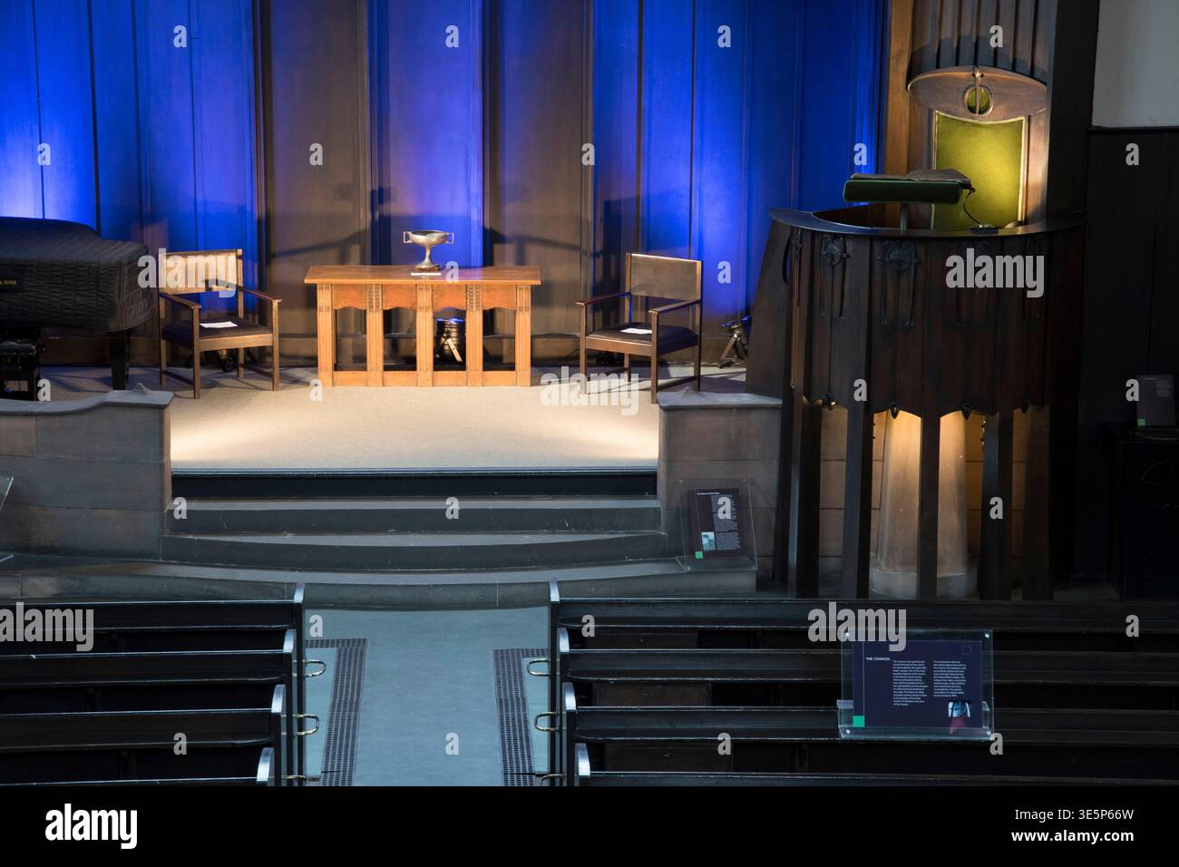 A Calm Empty Church Sanctuary Featuring A Simple Wooden Altar With a-calm-empty-church-sanctuary-featuring-a-simple-wooden-altar-with