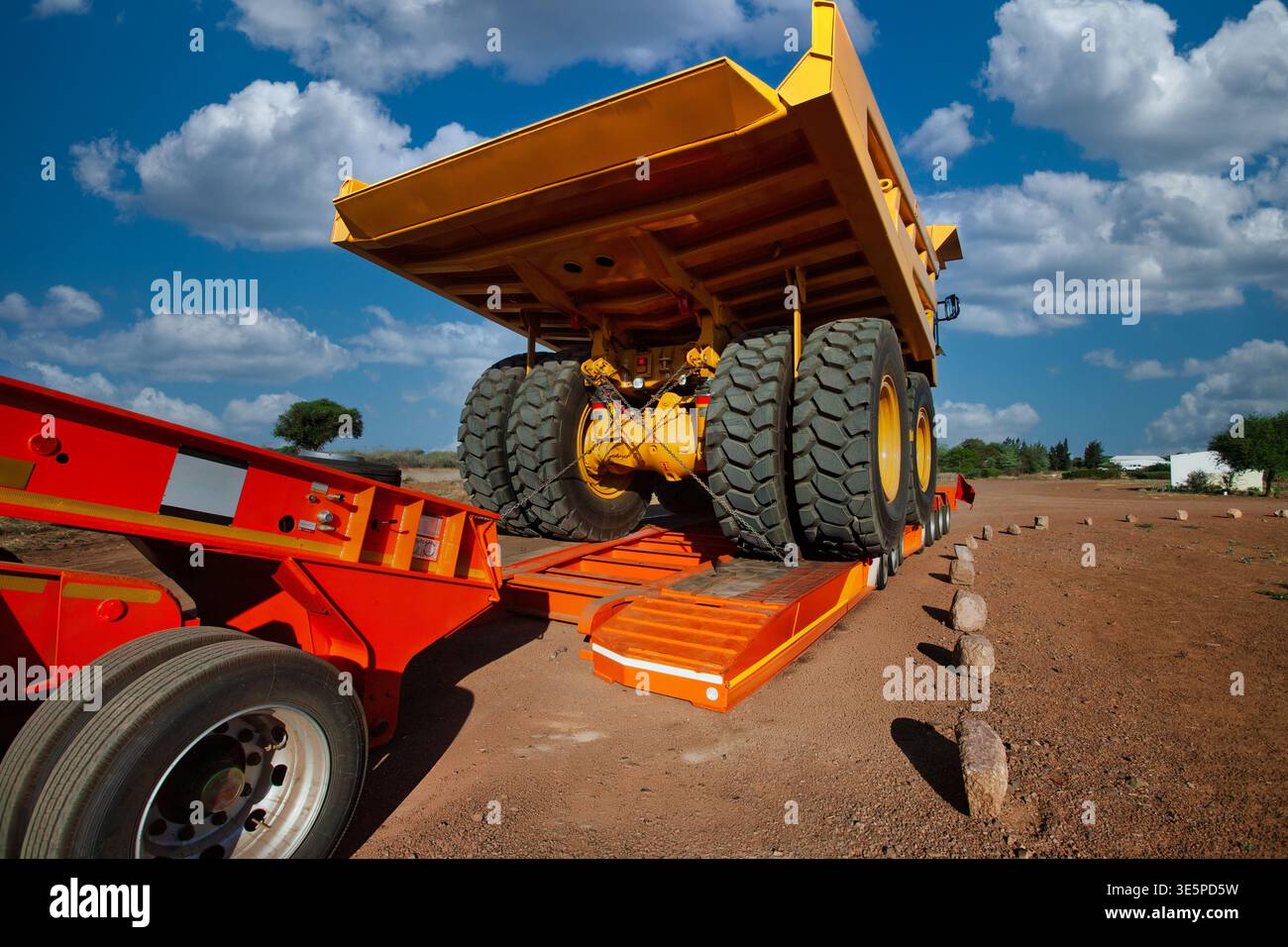 Obnormal Trailer Mining truck positioned on heavy haulage trailer ramp for abnormal load ...