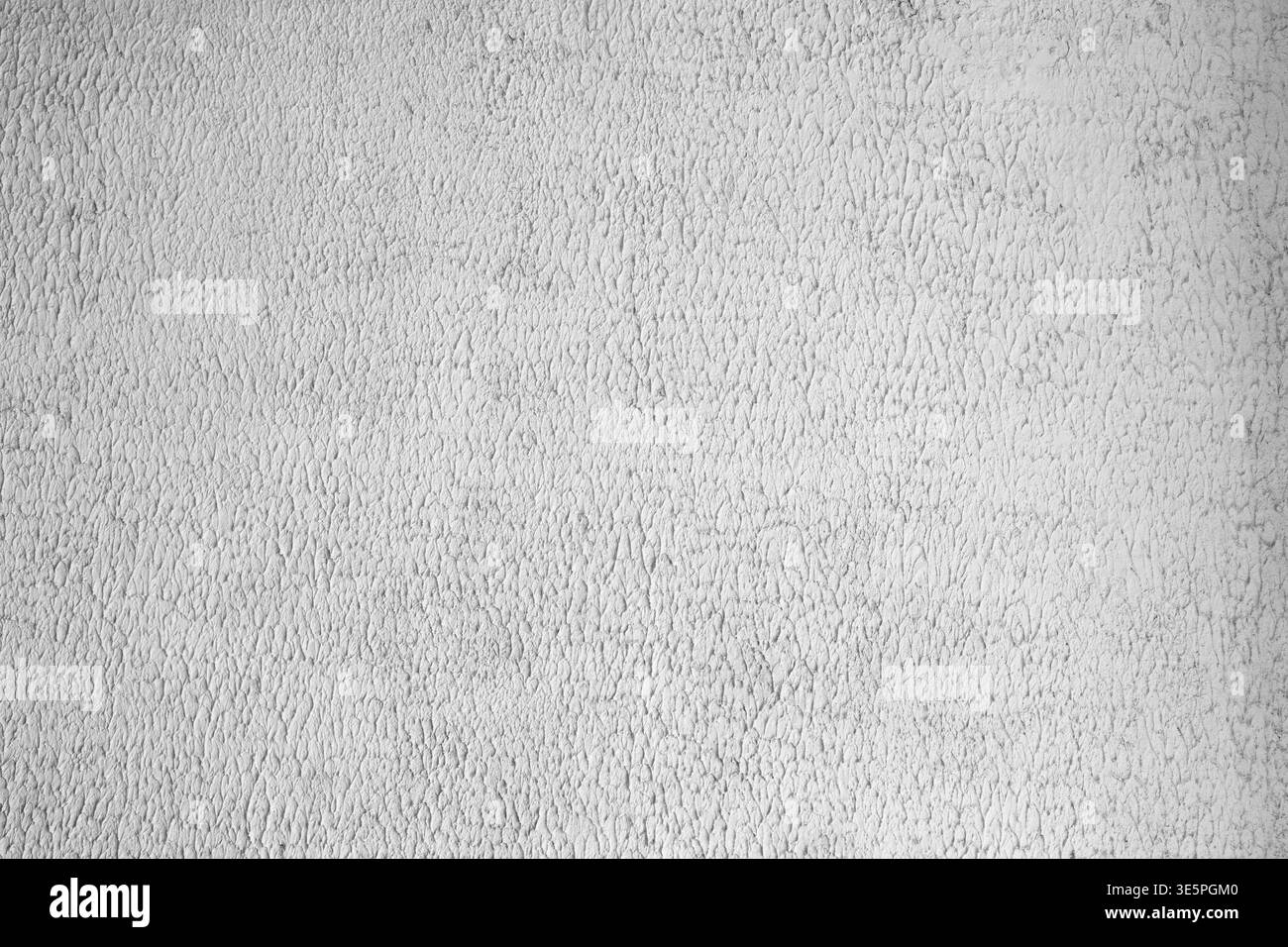 Grey textured concrete wall background with rough plaster surface and fine grain. Stock Photo