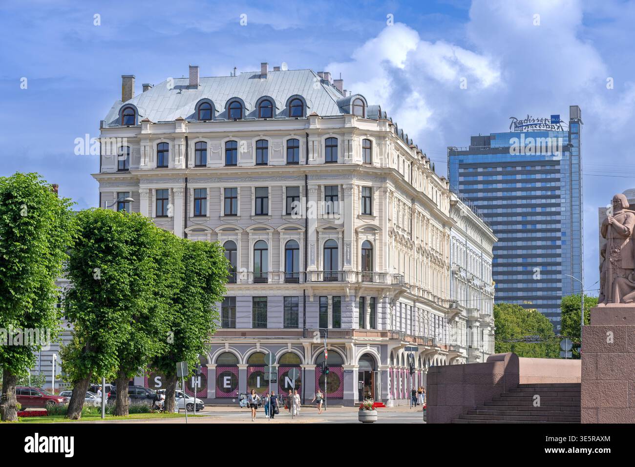 Luxurious apartments and Shein shop in 19th century Eclectic style building at 19 Brīvības Street in the capital city Riga in summer, Latvia Stock Photo
