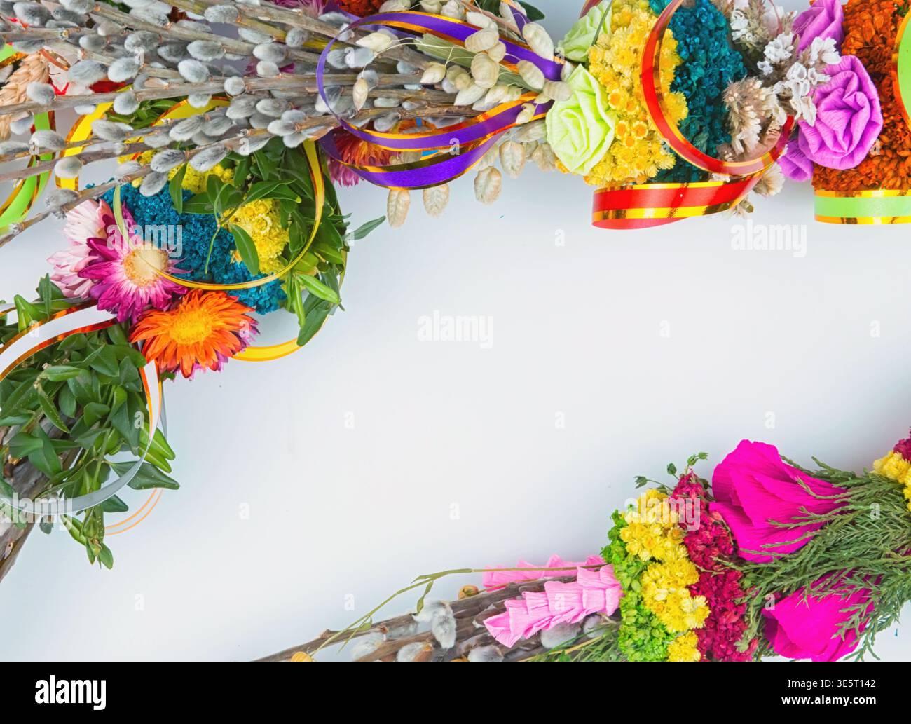 Easter eggs and willow branches on a white background Stock Photo