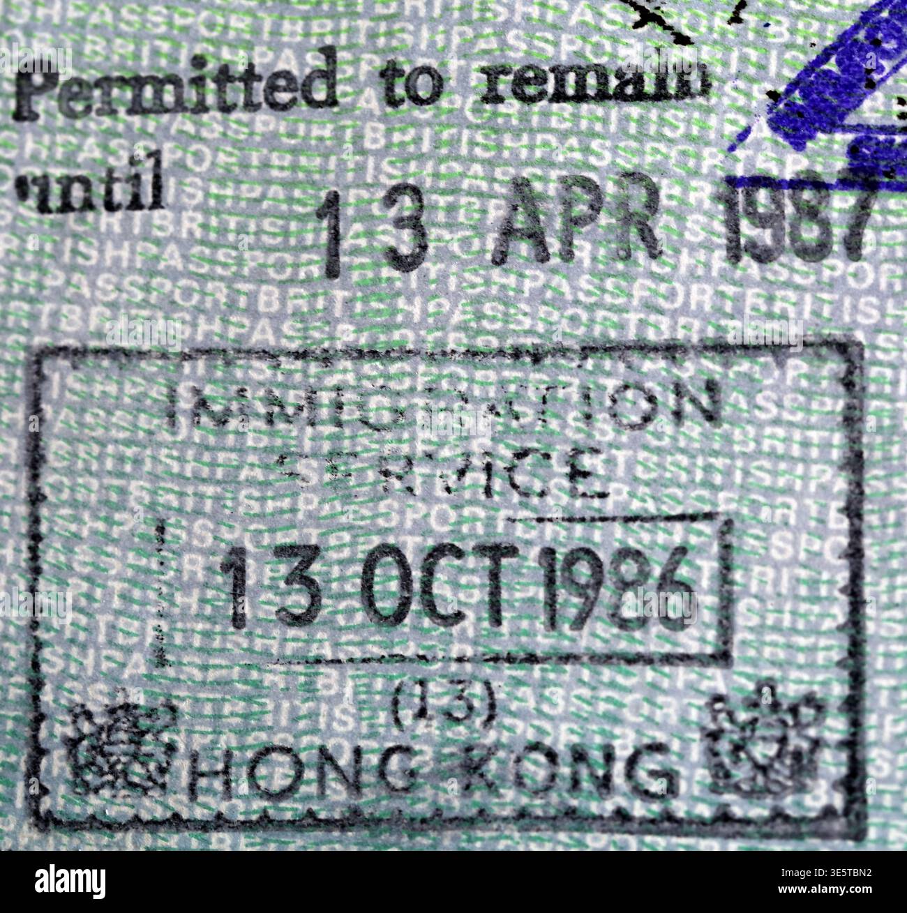 Hong Kong immigration passport stamp dated 13 October 1986, historic travel document detail. Stock Photo