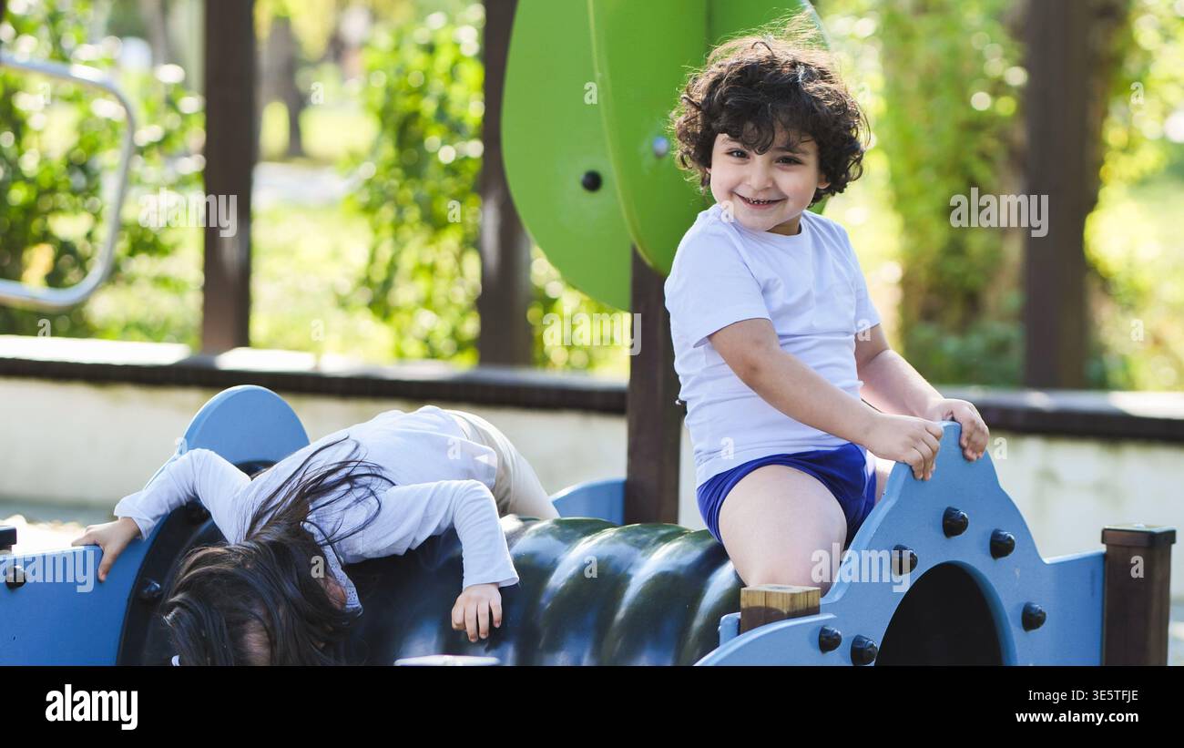 Child playing in outdoor park hi-res stock photography and images - Alamy