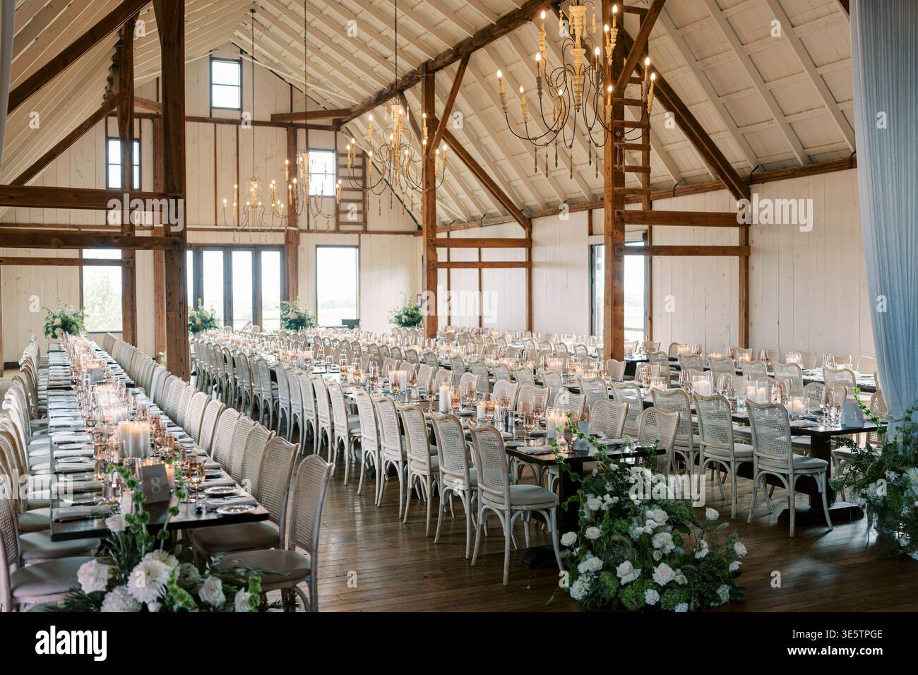 Cozy Communal Event With Natural Light And Rustic Charm Stock Photo