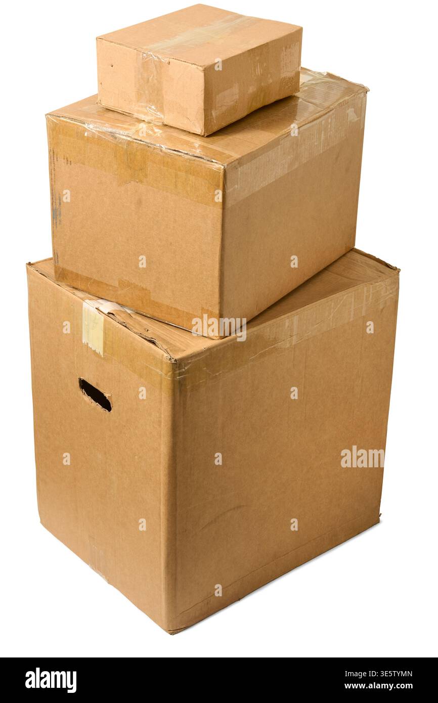 stack of closed brown used cardboard boxes isolated white background, multiple shipping cartons in different sizes, side view Stock Photo