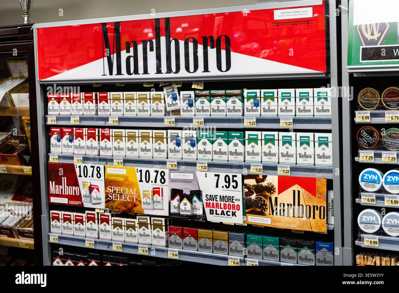 Marlboro Cigarettes Display Case At Store Checkout Counter Retail Tobacco  Section Interior Convenience Store Scene Stock Photo