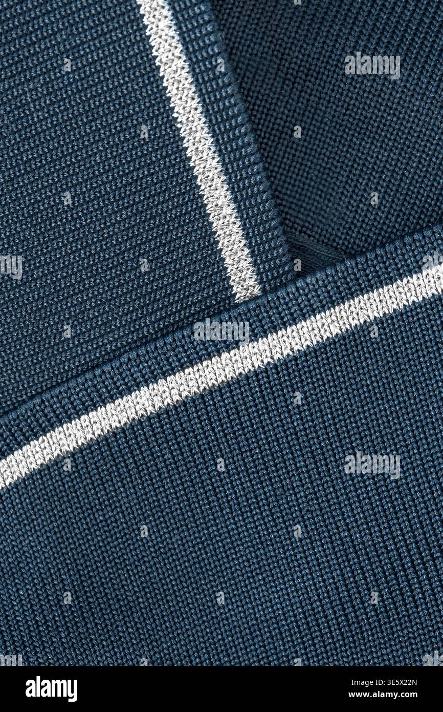 Dark blue knit fabric abstract background closeup Stock Photo