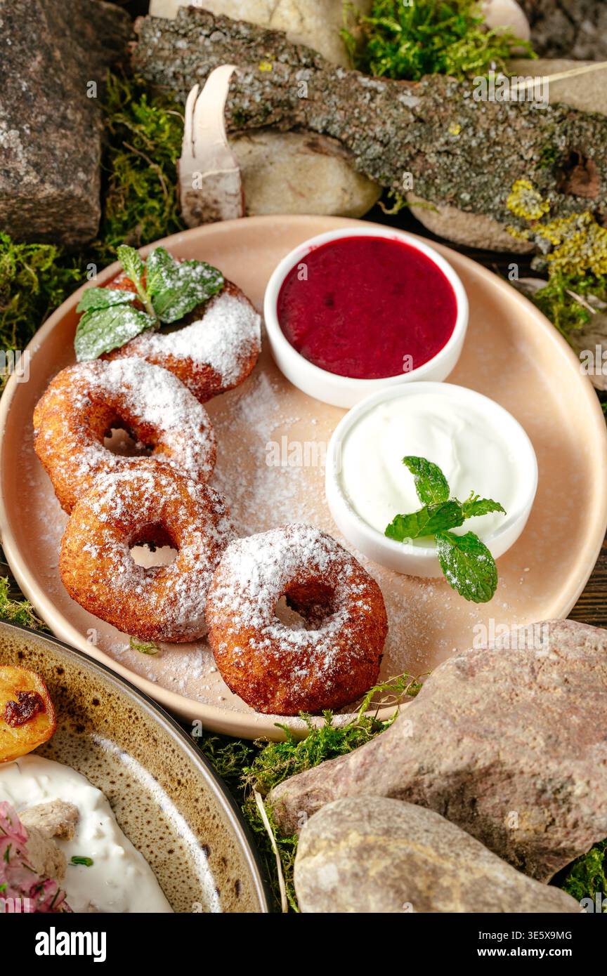 donuts in powdered sugar and jam Stock Photo