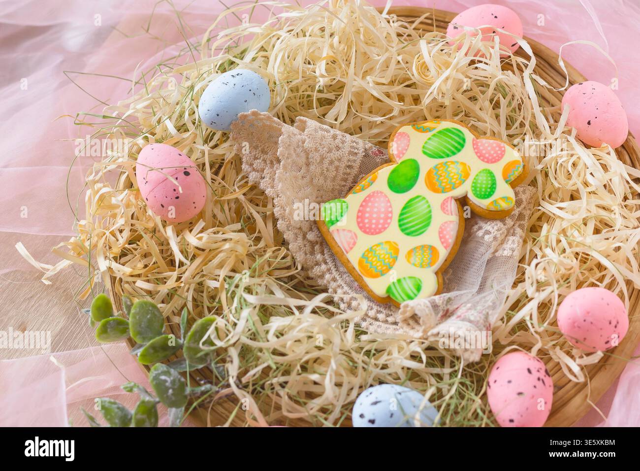 Easter holiday composition with decorated cookie eggs and spring festive background Stock Photo