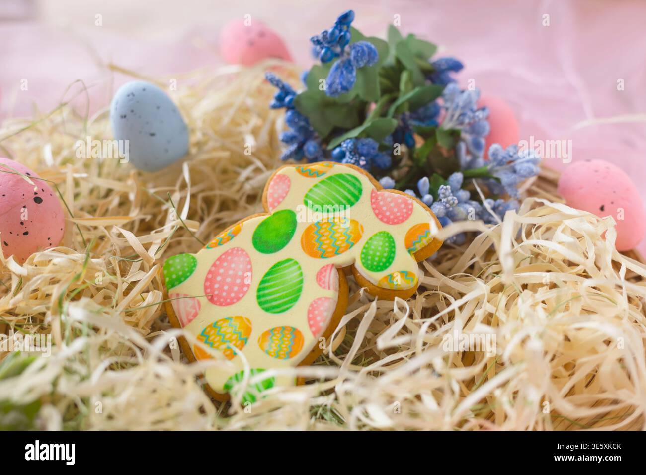 Easter holiday composition with decorated cookie eggs and spring festive background Stock Photo