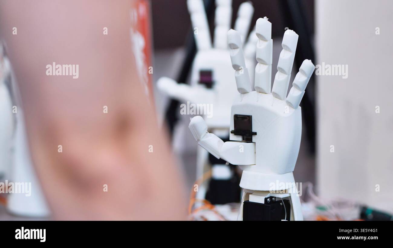 A close up shot of a white robotic hand, possibly a prototype ...