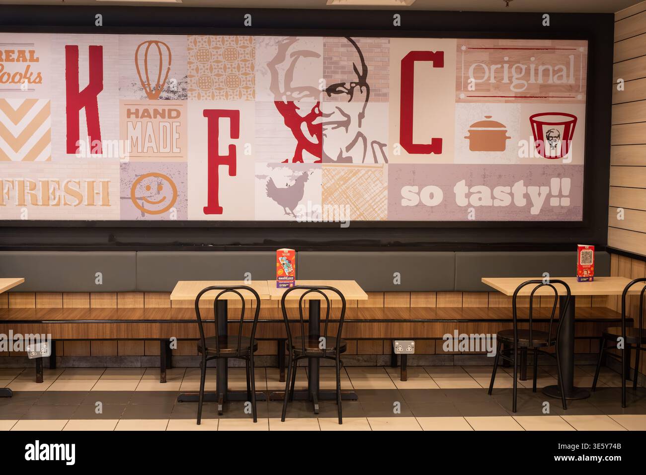 Penang, Malaysia - April 16, 2025: an empty KFC dining area shows wall ...