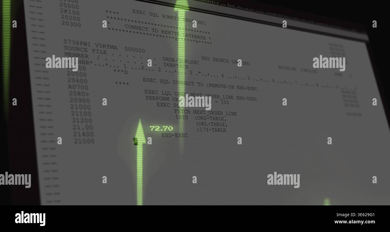 Showing monitor displaying terminal code with line numbers at dim desk ...