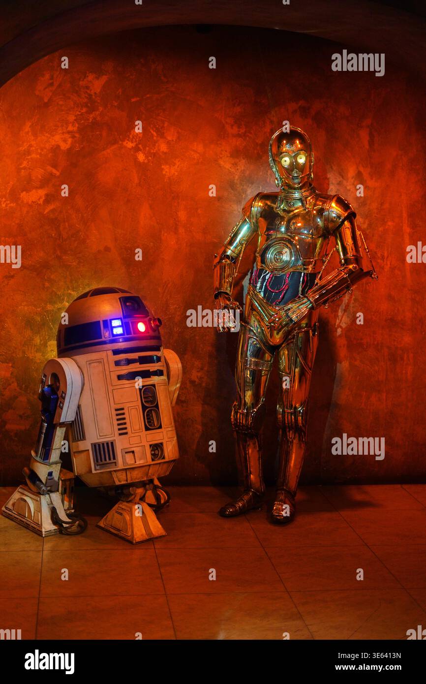 Two iconic Star Wars droids, R2-D2 and C-3PO, are displayed against a ...