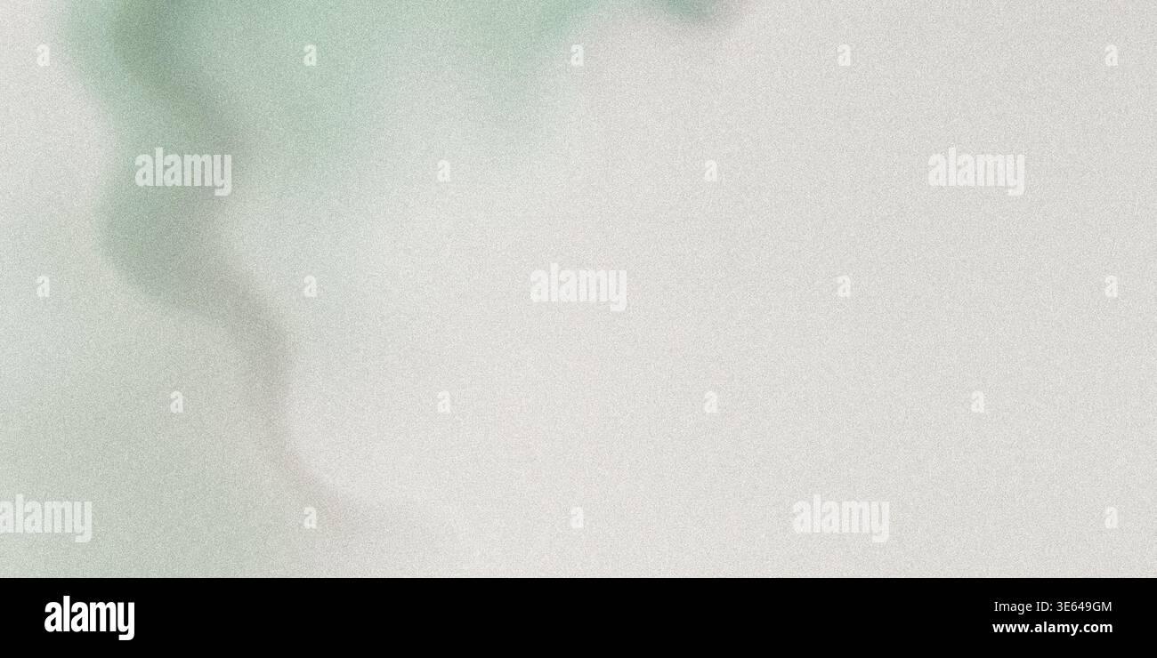 A green stain on a gray paper background texture with a rough surface and subtle gradient effect Stock Photo