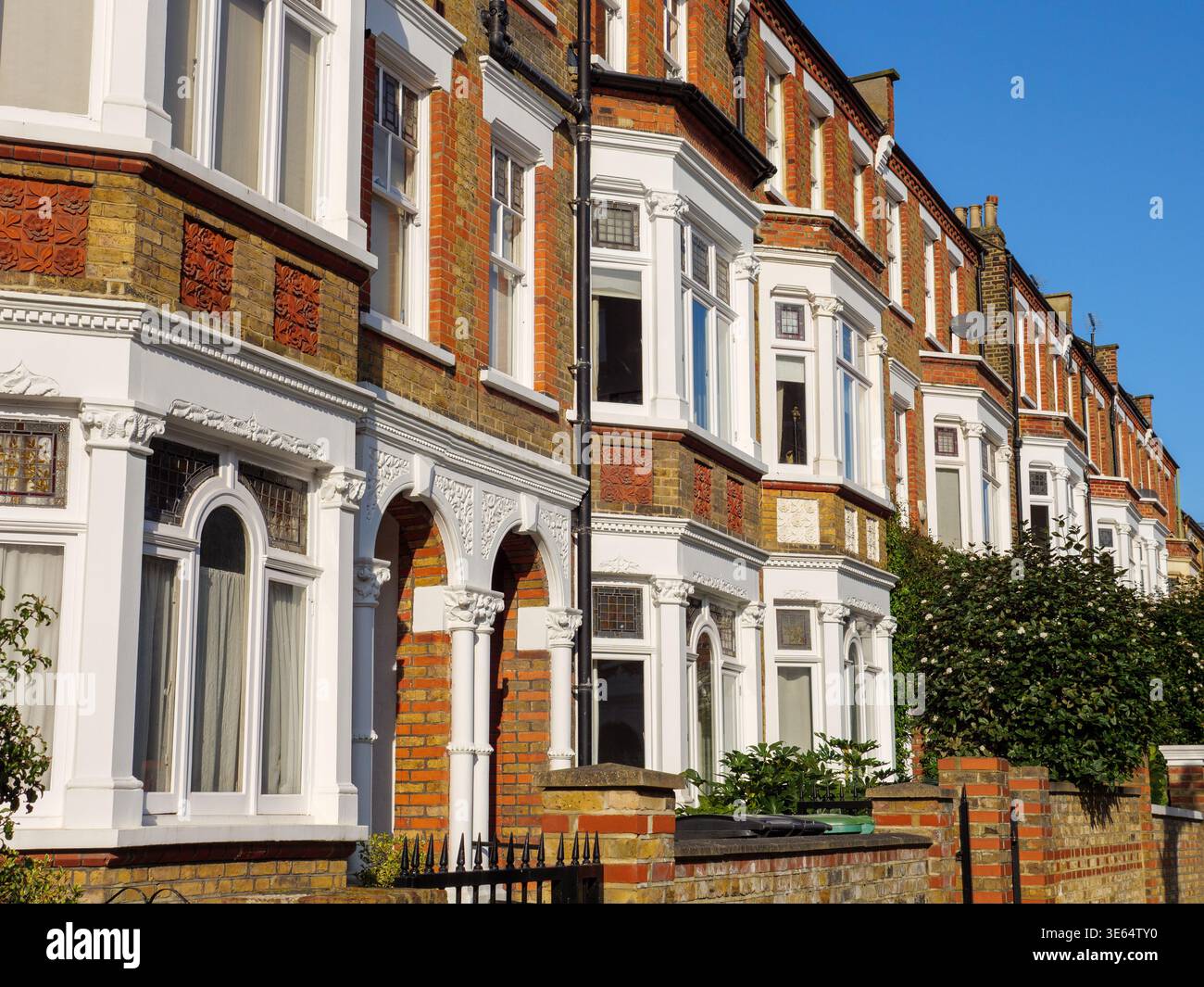 Row of terraced houses on residential street in Hampstead, London, UK Stock Photo