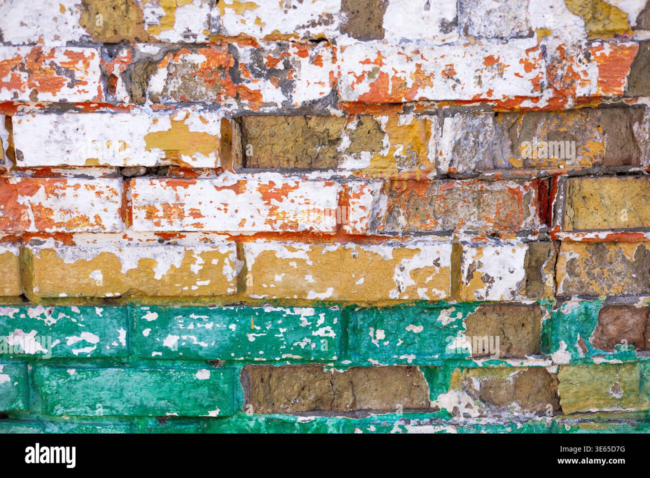 Colored old brick wall texture, weathered and rustic masonry background Stock Photo