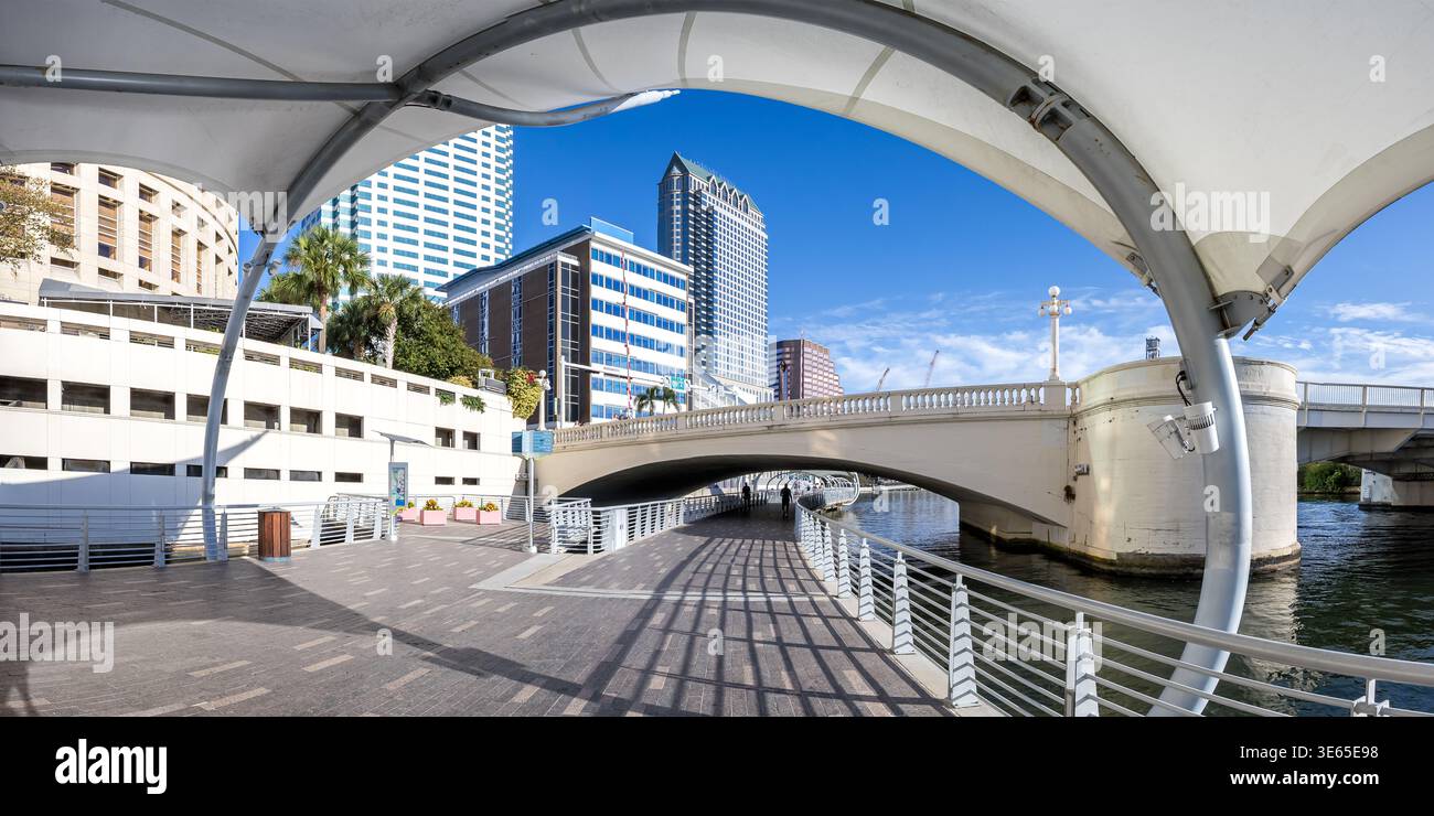 Tampa Riverwalk at Hillsborough River water panorama skyline with skyscrapers in downtown Tampa, United States Stock Photo