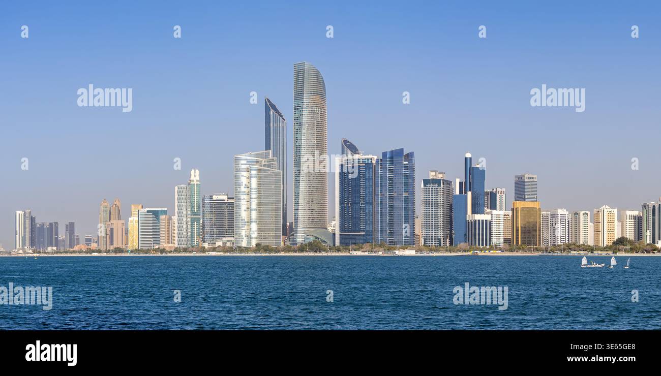 Abu Dhabi skyline with skyscrapers panorama at sea traveling in Abu Dhabi, United Arab Emirates Stock Photo