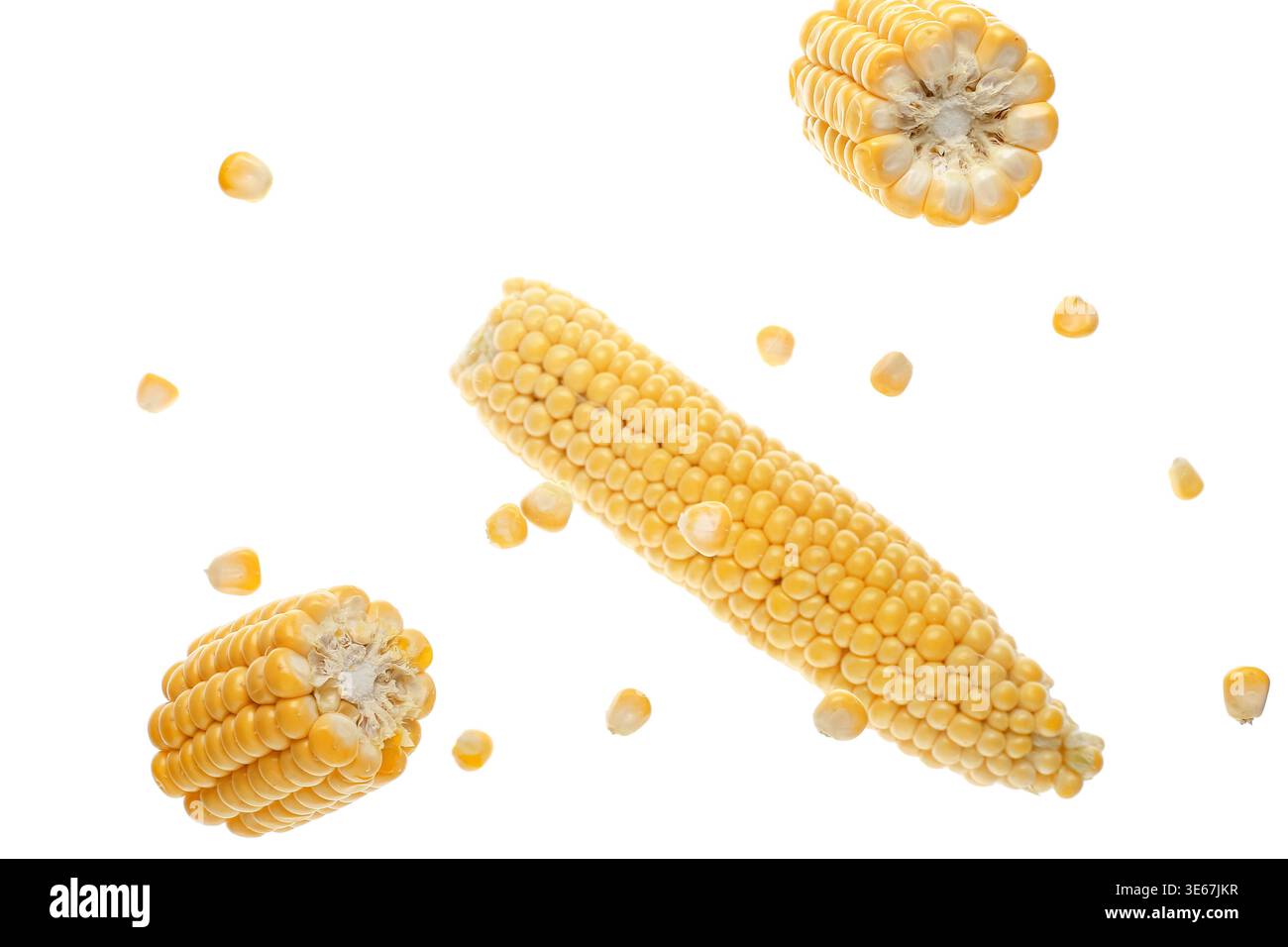 Flying corn cobs and kernels on white background Stock Photo