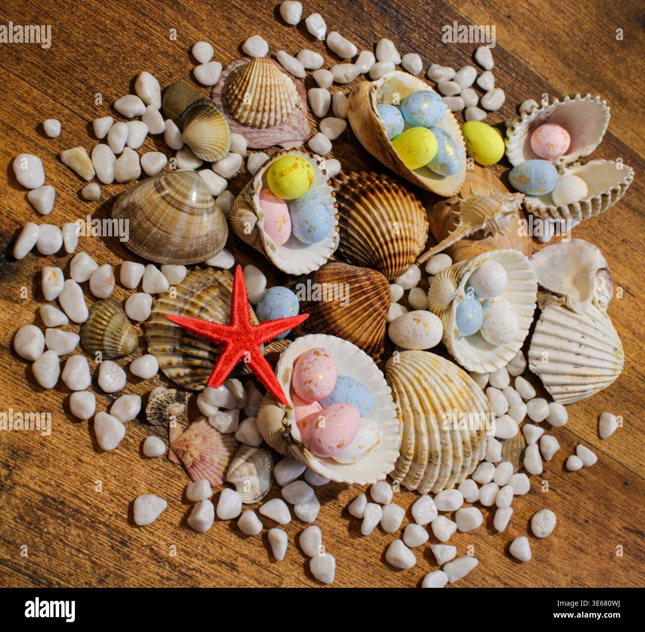 Easter beach with shells, eggs and starfish Stock Photo