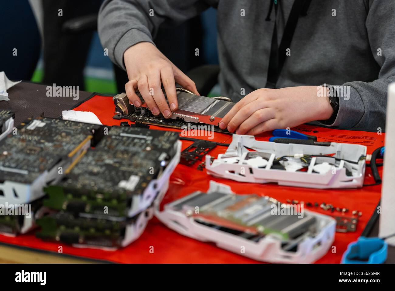 Person repairing computer graphics card hi-res stock photography and ...