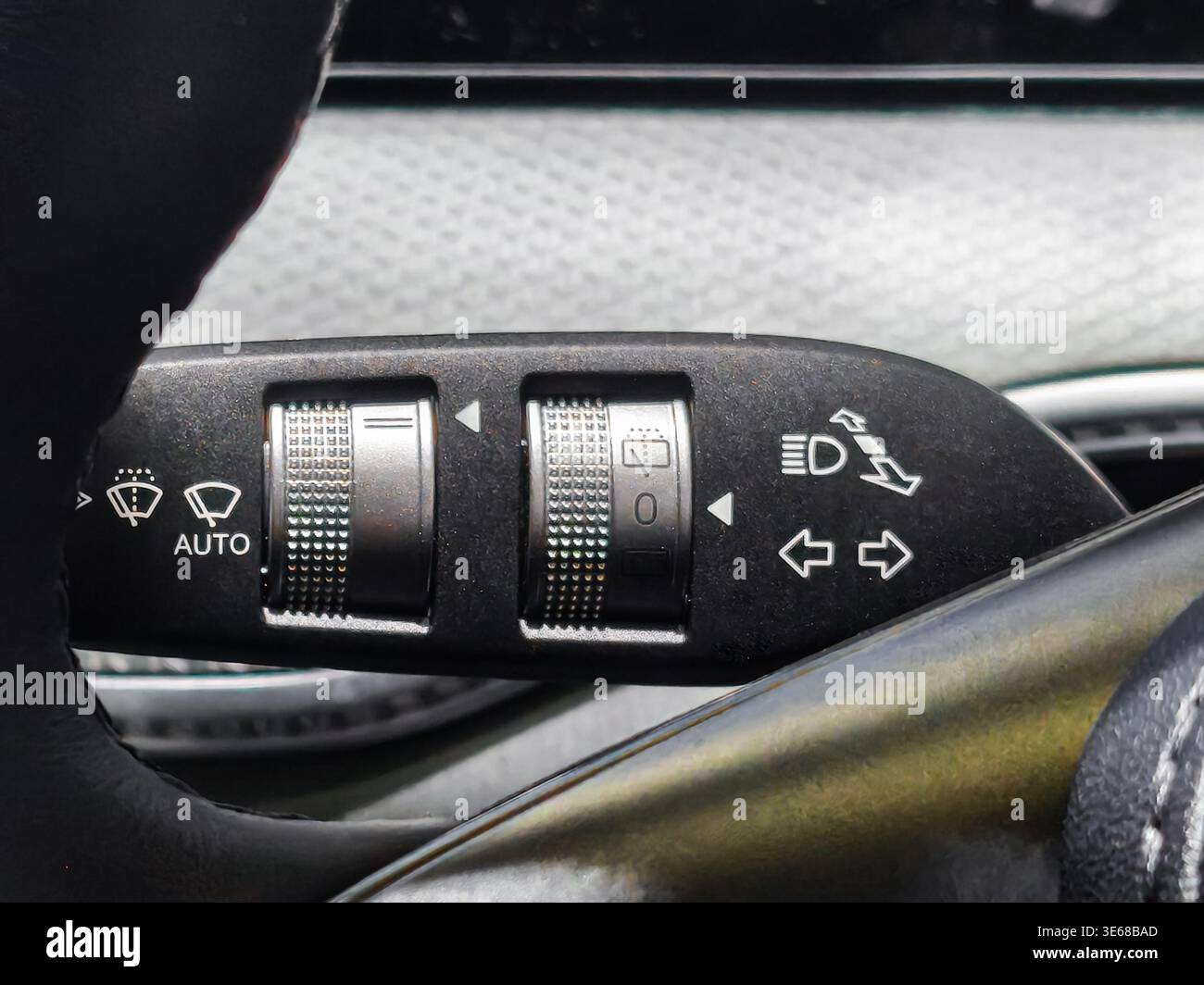 Wiper Control Graphics Close up of a multi-function steering column stalk in a modern car ...