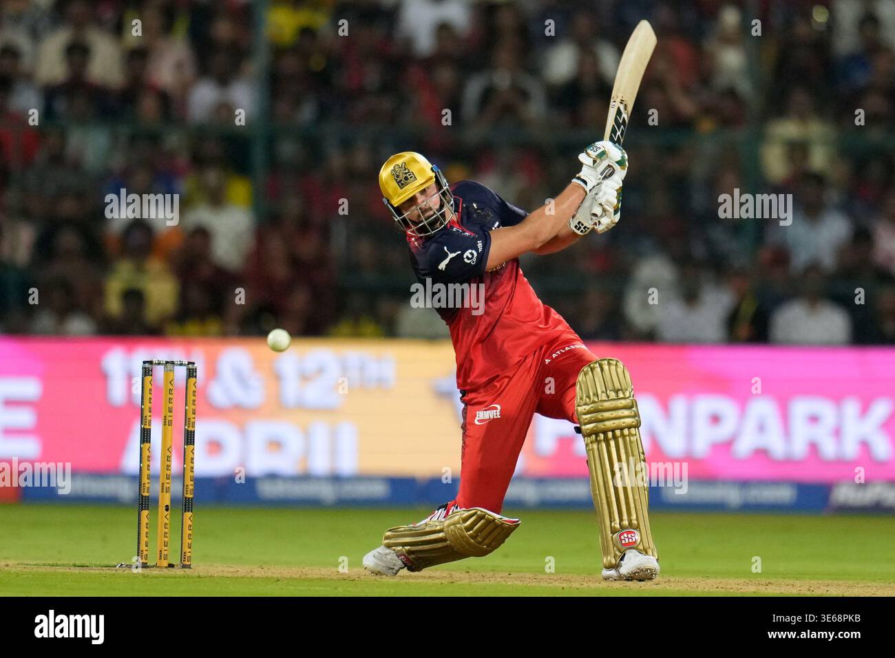 Royal Challengers Bengaluru's Tim David plays a shot during the Indian ...