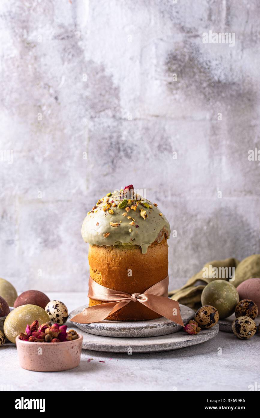 Traditional Easter cake kulich with pistachio Stock Photo