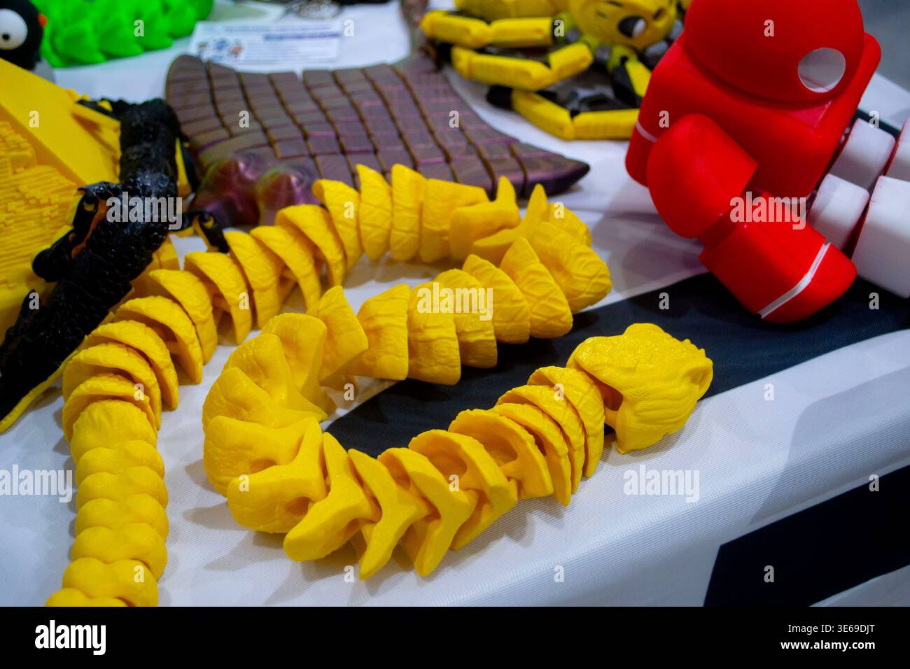 3D printed many different art objects. Objects printed on 3D printer from melted colored plastic. Models created on 3D printer from threads of molten plastic. Modern additive progressive technologies Stock Photo
