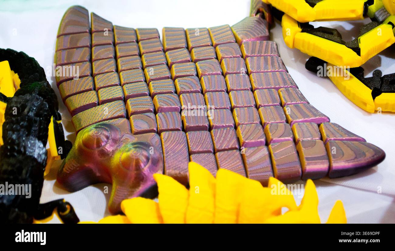3D printed many different art objects. Objects printed on 3D printer from melted colored plastic. Models created on 3D printer from threads of molten plastic. Modern additive progressive technologies Stock Photo