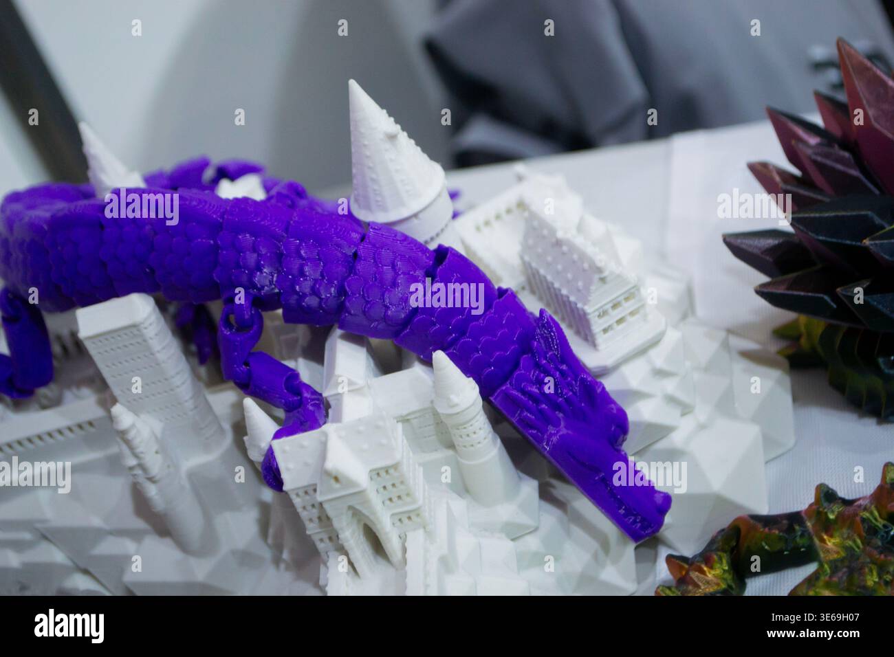 3D printed many different art objects. Objects printed on 3D printer from melted colored plastic. Models created on 3D printer from threads of molten plastic. Modern additive progressive technologies Stock Photo