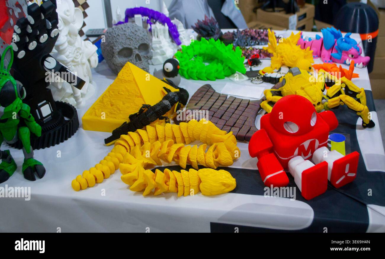 3D printed many different art objects. Objects printed on 3D printer from melted colored plastic. Models created on 3D printer from threads of molten plastic. Modern additive progressive technologies Stock Photo
