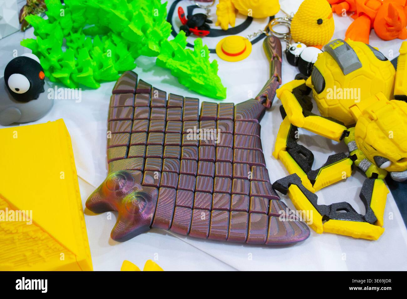 3D printed many different art objects. Objects printed on 3D printer from melted colored plastic. Models created on 3D printer from threads of molten plastic. Modern additive progressive technologies Stock Photo
