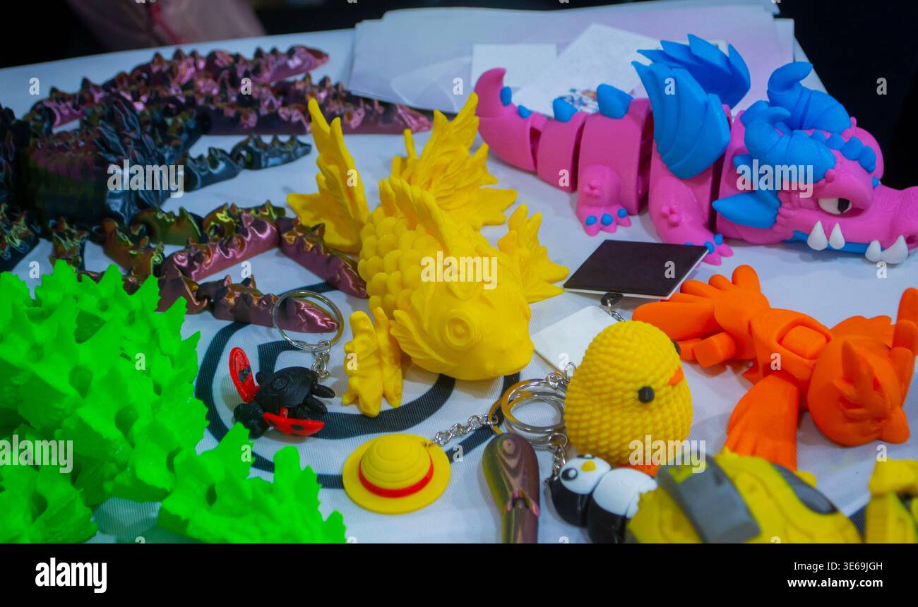 3D printed many different art objects. Objects printed on 3D printer from melted colored plastic. Models created on 3D printer from threads of molten plastic. Modern additive progressive technologies Stock Photo