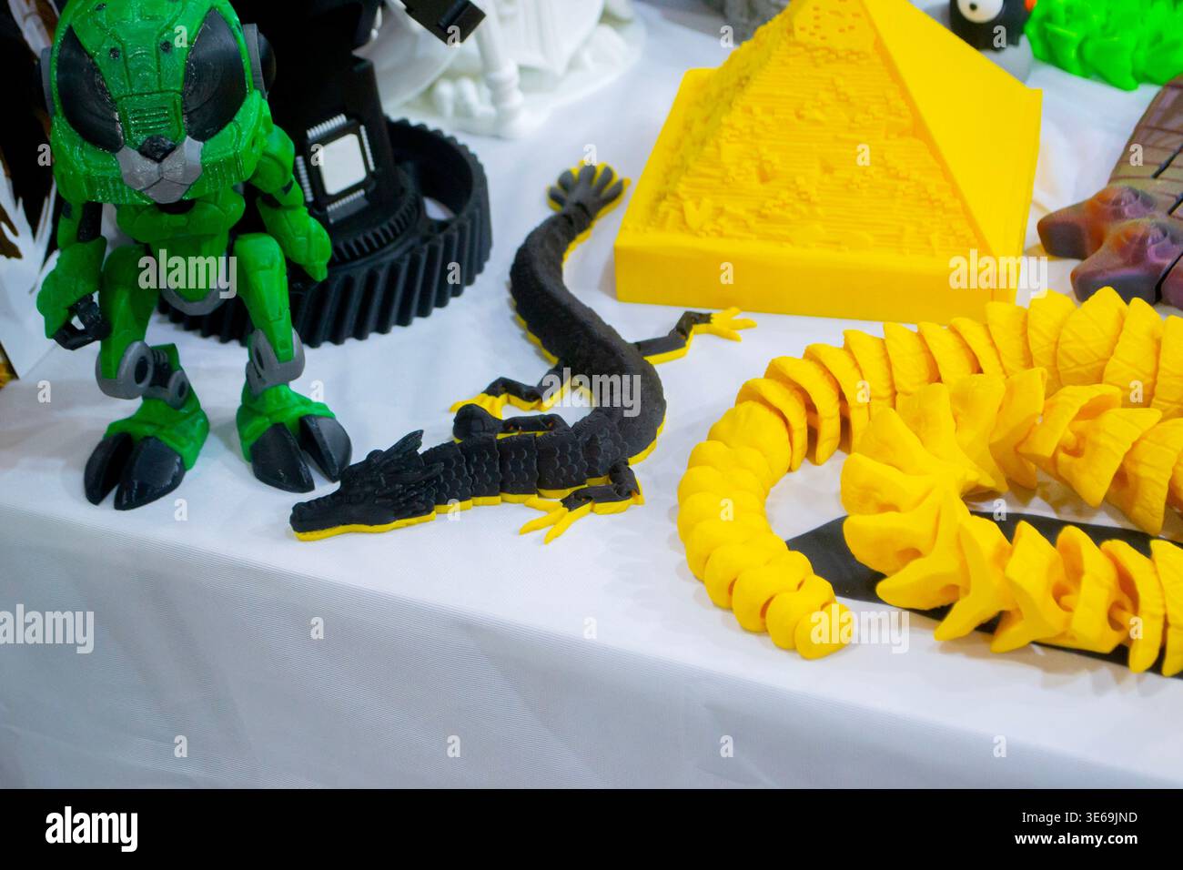 3D printed many different art objects. Objects printed on 3D printer from melted colored plastic. Models created on 3D printer from threads of molten plastic. Modern additive progressive technologies Stock Photo