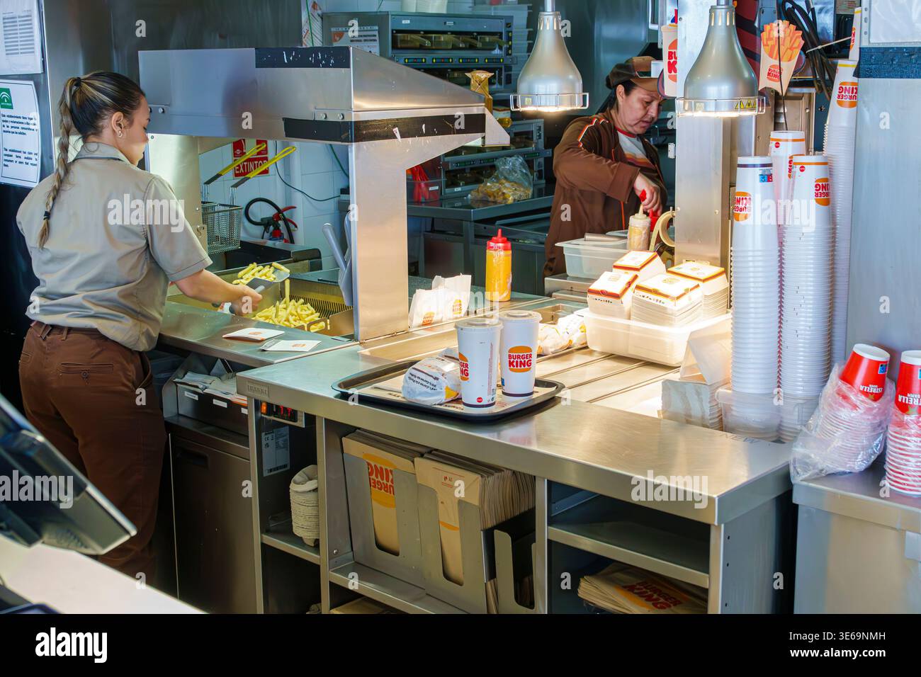 Fuengirola Spain,Andalusia,Burger King kitchen workers female employee ...