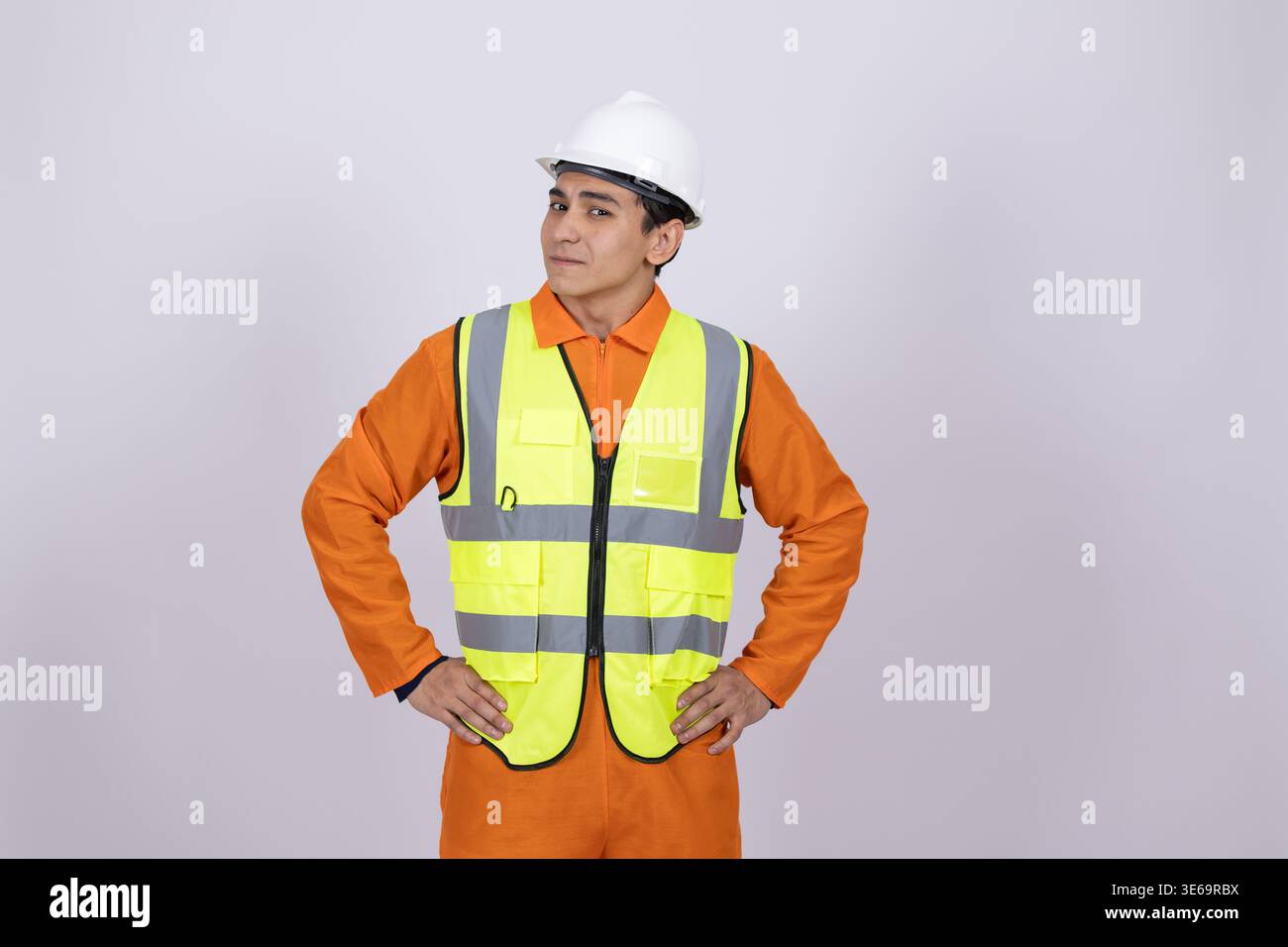 Builder in safety gear looking at the camera Stock Photo